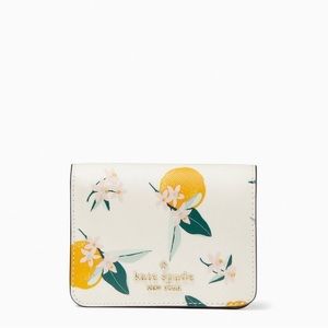 Kate Spade Clementine Orange Toss printed saffiano small compact bifold